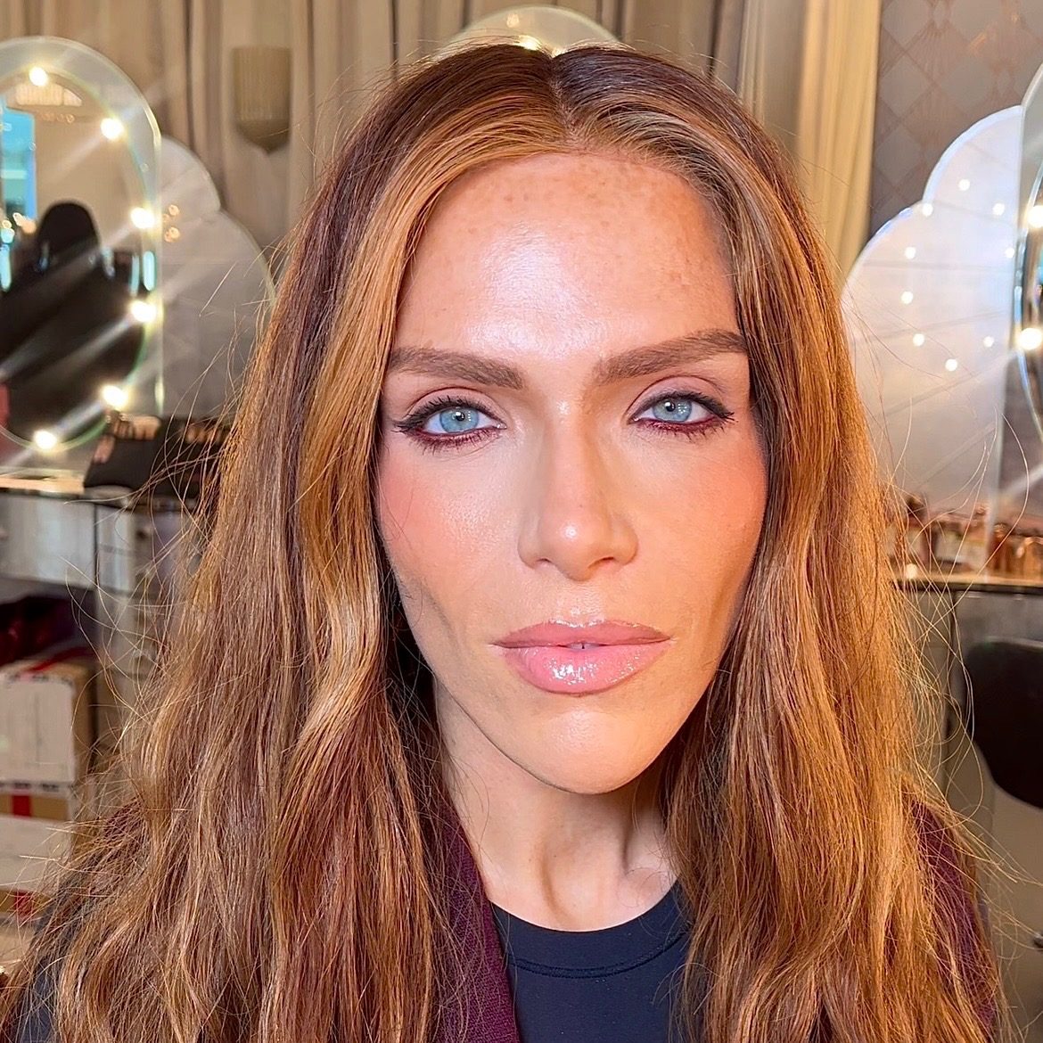 Studio soft glam with blonde waves